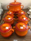 A SET OF LE CREUSET SOUP TUREEN AND SIX SMALL LIDDED SOUP BOWLS.