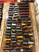 A LARGE COLLECTION OF RAILWAY ROLLING STOCK AND A ROYAL MAIL CARRIAGE