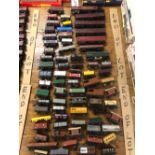 A LARGE COLLECTION OF RAILWAY ROLLING STOCK AND A ROYAL MAIL CARRIAGE