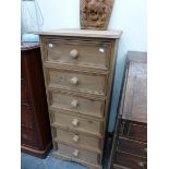 A PINE WELLINGTON CHEST OF SIX DRAWERS. W 53 x D 45 x H 123cms.