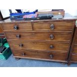A MAHOGANY CHEST OF TWO SHORT AND THREE GRADED DRAWERS, EACH WITH KNOB HANDLES BELOW A TOP WITH