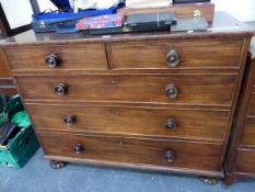 A MAHOGANY CHEST OF TWO SHORT AND THREE GRADED DRAWERS, EACH WITH KNOB HANDLES BELOW A TOP WITH