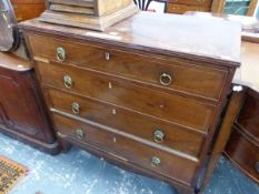 A CROSS BANDED MAHOGANY CHEST OF FOUR GRADED DRAWERS WITH BRASS ROSETTE AND RING HANDLES ABOVE