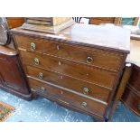 A CROSS BANDED MAHOGANY CHEST OF FOUR GRADED DRAWERS WITH BRASS ROSETTE AND RING HANDLES ABOVE