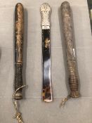 TWO TRUNCHEONS, AND A TORTOISE SHELL LETTER OPENER.