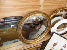 A COLLECTION OF ANTIQUE AND LATER DECORATIVE MIRRORS, INCLUDING ART DECO EXAMPLES, SOME WITH GILT