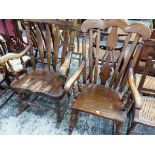 TWO SADDLE SEATED ROCKING CHAIRS WITH WAVY TOP RAILS AND WITH ARMS