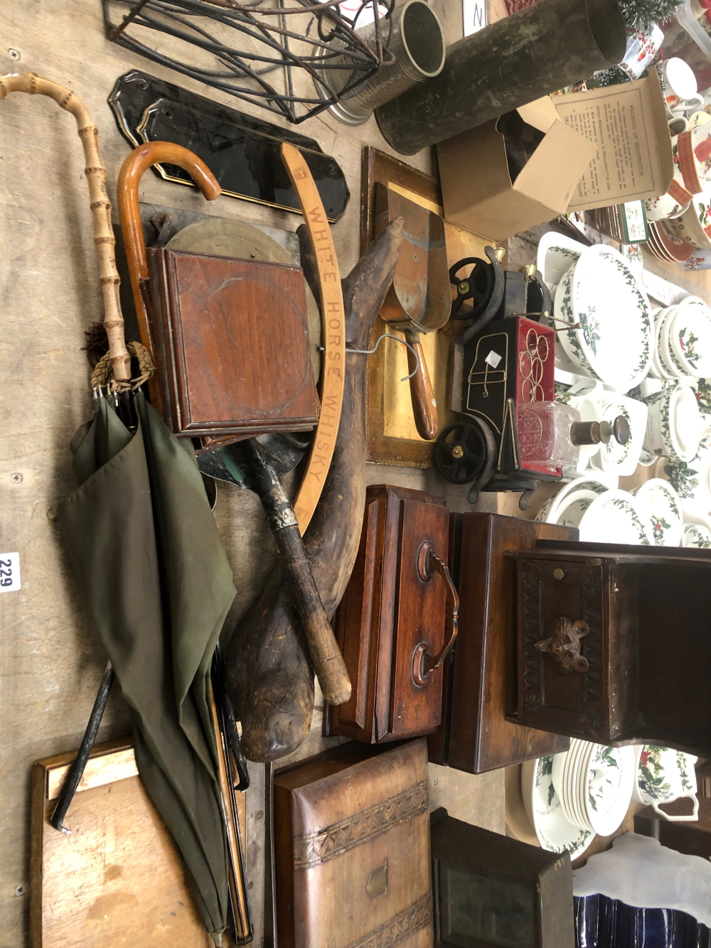 A COLLECTION OF ANTIQUE BOXES, A SMALL GUILLOTINE, A WHITE HORSE WHISKEY ADVERTISING COAT HANGER,