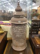 A PIERCED METAL LARGE LANTERN.