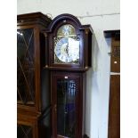 A MODERN LONG CASE CLOCK.