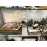 THREE STEREOSCOPIC VIEWERS AND A QUANTITY OF SLIDES INCLUDING FIRST WORLD WAR IMAGES AND CUNARD