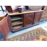 A 19th C. MAHOGANY SIDE CABINET WITH TWO DOORS FLANKING A CENTRAL PANEL ABOVE THE PLINTH FOOT. W 137