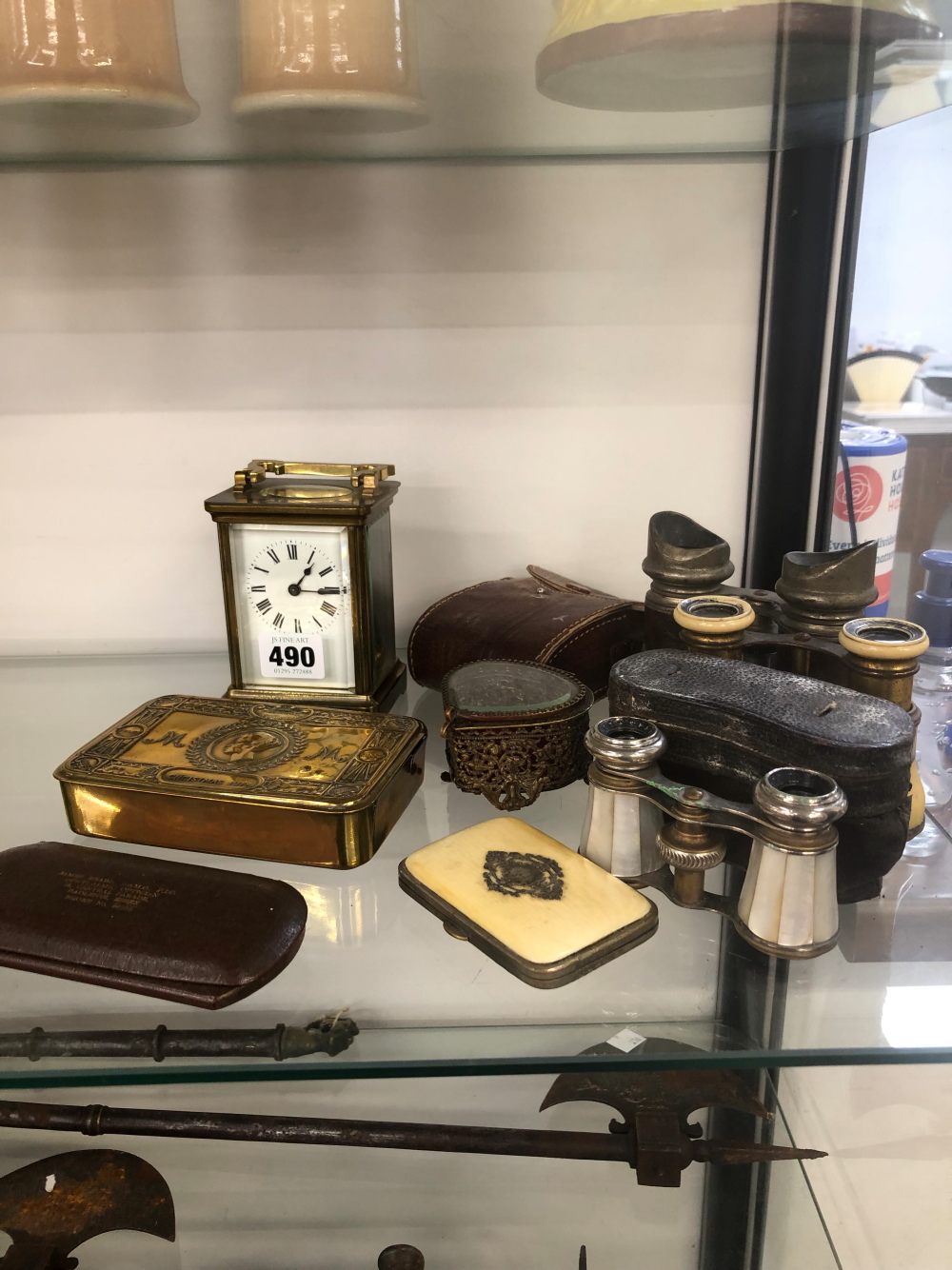 A SMALL BRASS CASED CARRIAGE CLOCK, FOUR PAIRS OF BINOCULARS, A 1914 CHRISTMAS TIN ETC.