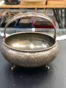 A RUSSIAN SILVER, ENGRAVED SWING HANDLED SMALL BASKET.