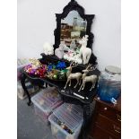 AN EDWARDIAN EBONISED MIRROR BACK DRESSING TABLE, THE SHAPED FRONT WITH TWO LEAF CARVED DRAWERS,