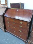 A GEORGE III MAHOGANY BUREAU, THE FALL ABOVE FOUR GRADED LONG DRAWERS AND BRACKET FEET. W 98 x D