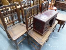 A SET OF FIVE OAK SPINDLE BACKED AND PANEL SEATED CHAIRS WITH TURNED FRONT LEGS