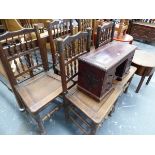 A SET OF FIVE OAK SPINDLE BACKED AND PANEL SEATED CHAIRS WITH TURNED FRONT LEGS