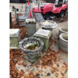 THREE CONCRETE PEDESTALS AND FOUR GARDEN PLANTERS