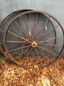 TWO LARGE CAST IRON WHEELS. D. 128cms