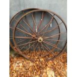 TWO LARGE CAST IRON WHEELS. D. 128cms