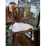 AN OAK STICK BACK KITCHEN CHAIR TOGETHER WITH A ROSEWOOD OVAL THREE BAR BACKED SIDE CHAIR WITH CANED