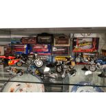 A COLLECTION OF VARIOUS MODEL MOTORCYCLES, BUSES ETC.