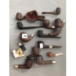 A CARVED MEERSCHAUM PIPE IN CASE AND VARIOUS BRIAR PIPE BOWLS.
