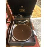 A HMV PORTABLE GRAMOPHONE MODEL 101, A LATE VERSION 1931, IN A BLACK CASE.