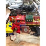 TWO PAIRS OF BINOCULARS, A GAS MASK, VARIOUS TOYS INCLUDING AN ANTIQUE SMALL DOLL ETC.