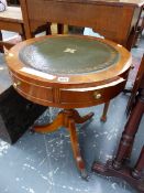 A 20th C. MAHOGANY DRUM TABLE, THE LEATHER INSET TOP OVER REAL AND CONCEIT DRAWERS, THE LEGS ON PAW