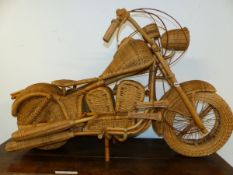 A WICKER HANDMADE MODEL OF A HARLEY DAVIDSON MOTORCYCLE.