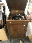 A HMV CABINET GRAMOPHONE MODEL 157 IN AN OAK CABINET FITTED WITH RARE HMV NO. 5 SOUND BOX CIRCA