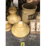 A LARGE WHITE PORCELAIN LAMP WITH PUTTI, A SMALL BRASS FRAMED MIRROR, CROCK POTS ETC.