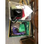 A LARGE COLLECTION OF VINTAGE HANDBAGS AND HATS.