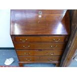 A 19th C. MAHOGANY BUREAU, THE FALL ABOVE FOUR GRADED DRAWERS AND BRACKET FEET. W 76 x D 46 x H