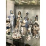 A GROUP OF LLADRO, NAO AND OTHER PORCELAIN FIGURINES.