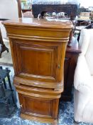 A PAIR OF 20th C. BEDSIDE CUPBOARDS, THE SLIGHTLY BOWED DOORS ENCLOSING SHELVES, EACH. W 51 x D 38.5