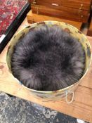 A VINTAGE FUR HAT WITH LABEL, MISS DOLORES, LONDON PARIS.