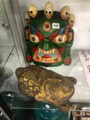 TWO WOODEN PAINTED MASKS.