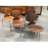 A SET OF SIX ARNE JACOBSEN FOR FRITZ HANSEN ANT CHAIRS, THE PLYWOOD BACKS AND SEATS TO EACH ON THREE