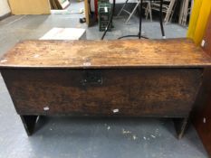 AN EARLY 18th C. OAK COFFER WITH SINGLE PLANK LID AND SIDES. W 99 x D 32 x H 54cms.