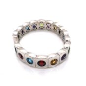 A PAIR OF INTERESTING CONTEMPORARY GEM SET BANGLES TOGETHER WITH A MATCHING PAIR OF EAR CLIPS. THE