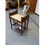 AN EDWARDIAN LINE INLAID MAHOGANY TWO TIER STOOL, THE BOARDED NARROW SIDES ABOVE THREE BARS