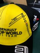 FORMULA 1 RENAULT- A YELLOW SIGNED CAP SIGNED BY DANIEL RICARDO AND ESTABAN OCON TO BE SOLD IN