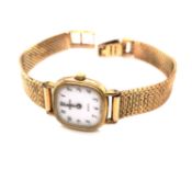 A 9ct YELLOW GOLD LADIES ZENITH QUARTZ WATCH ON A MILANESE STYLE LADDER CLASP BRACELET. DATED