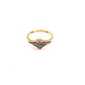 AN ANTIQUE 18ct AND PLATINUM FOUR STONE DIAMOND RING. FINGER SIZE 0. WEIGHT 2.51grms