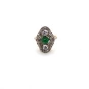 AN ART DECO STYLE CABOCHON EMERALD AND DIAMOND PANEL RING. UNHALLMARKED AND ASSESSED AS 14ct