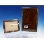 TWO HALLMARKED SILVER PHOTO FRAMES THE LARGER 13.5cm X 20.5cm BRIMINGHAM 1926. THE SMALLER FRAME
