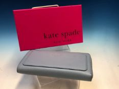 A PALE BLUE KATE SPADE PURSE COMPLETE WITH BOX